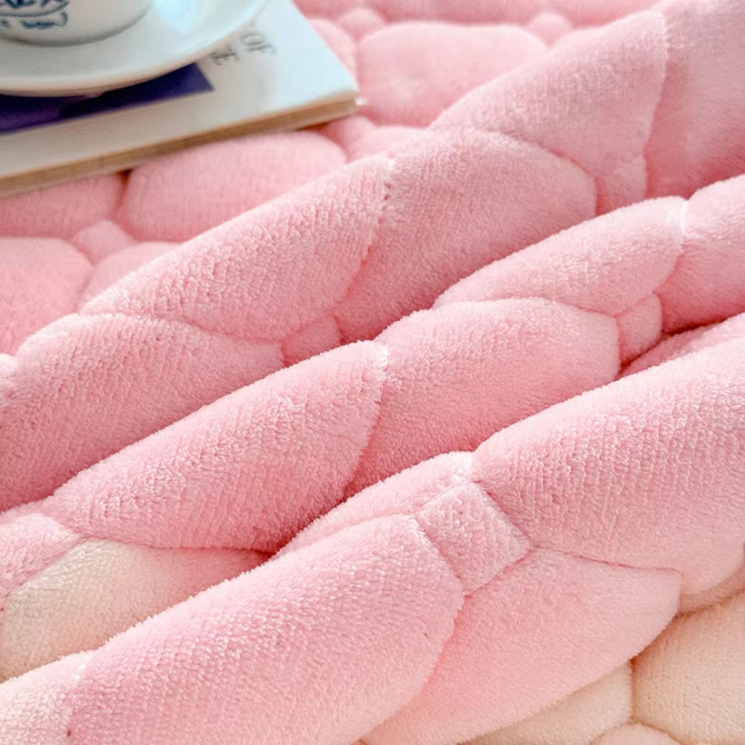 Close-up of soft fluffy fleece mattress pad texture