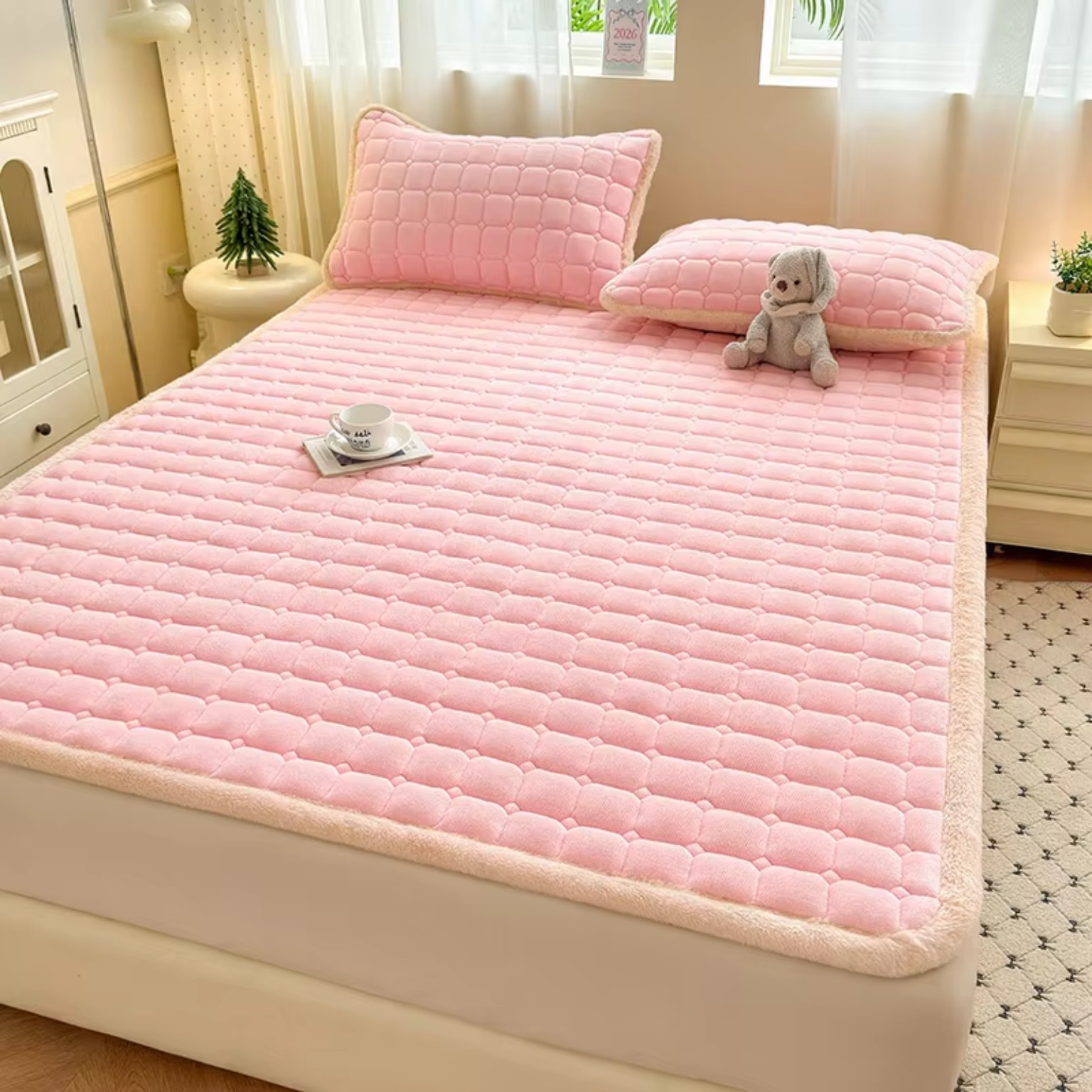 Quilted mattress pad rolled for storage