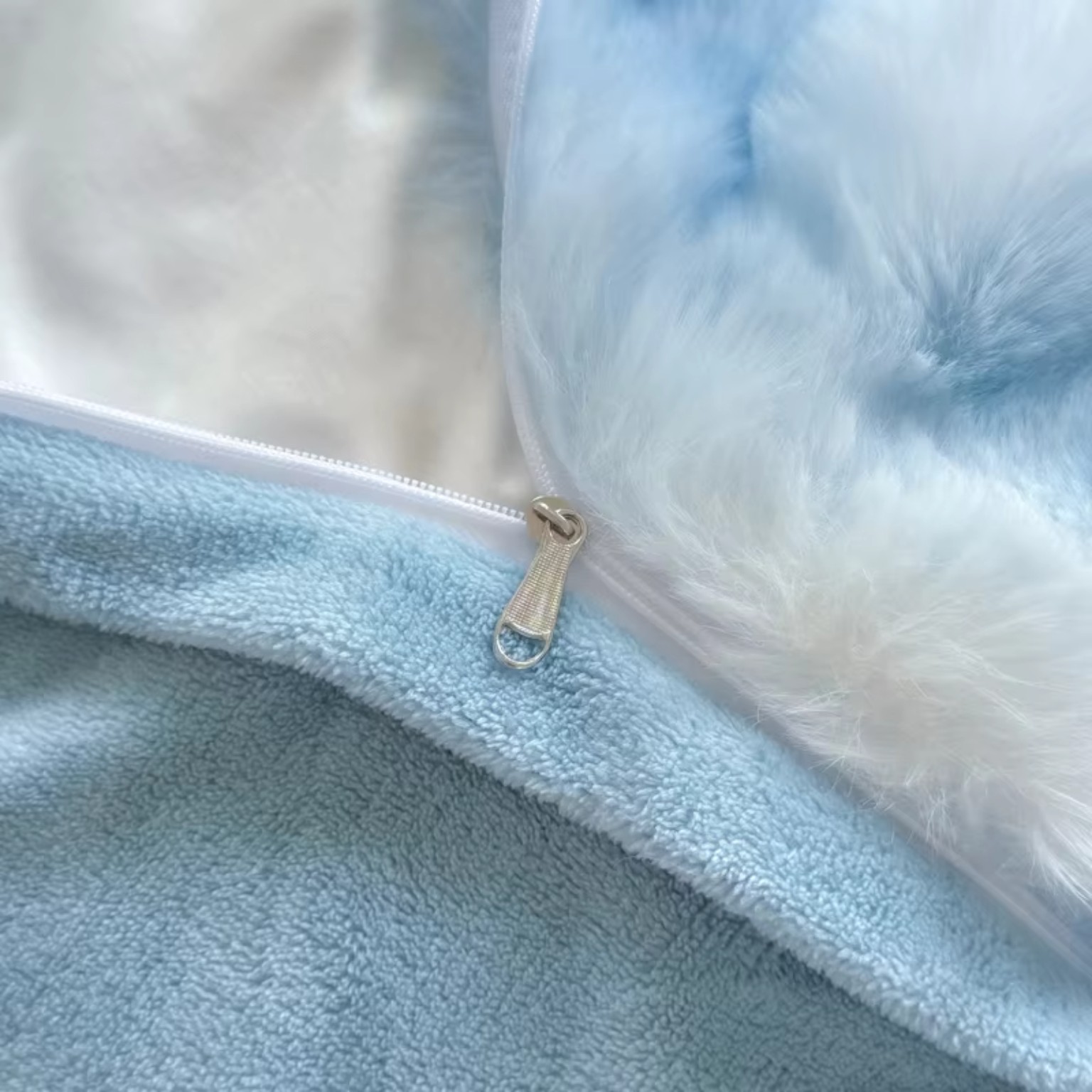 Blue plush fleece texture close-up