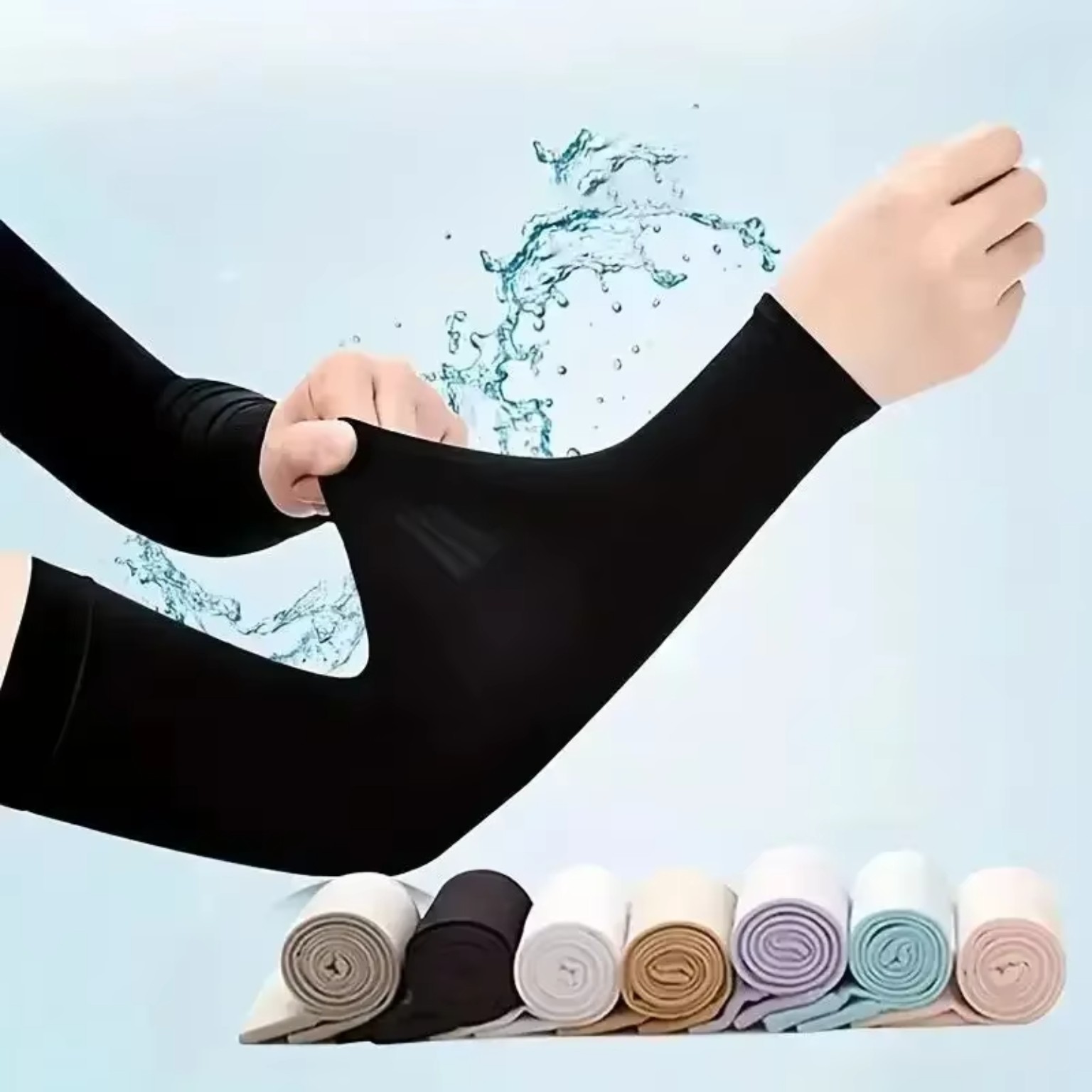 Black cooling arm sleeves stretched for outdoor use